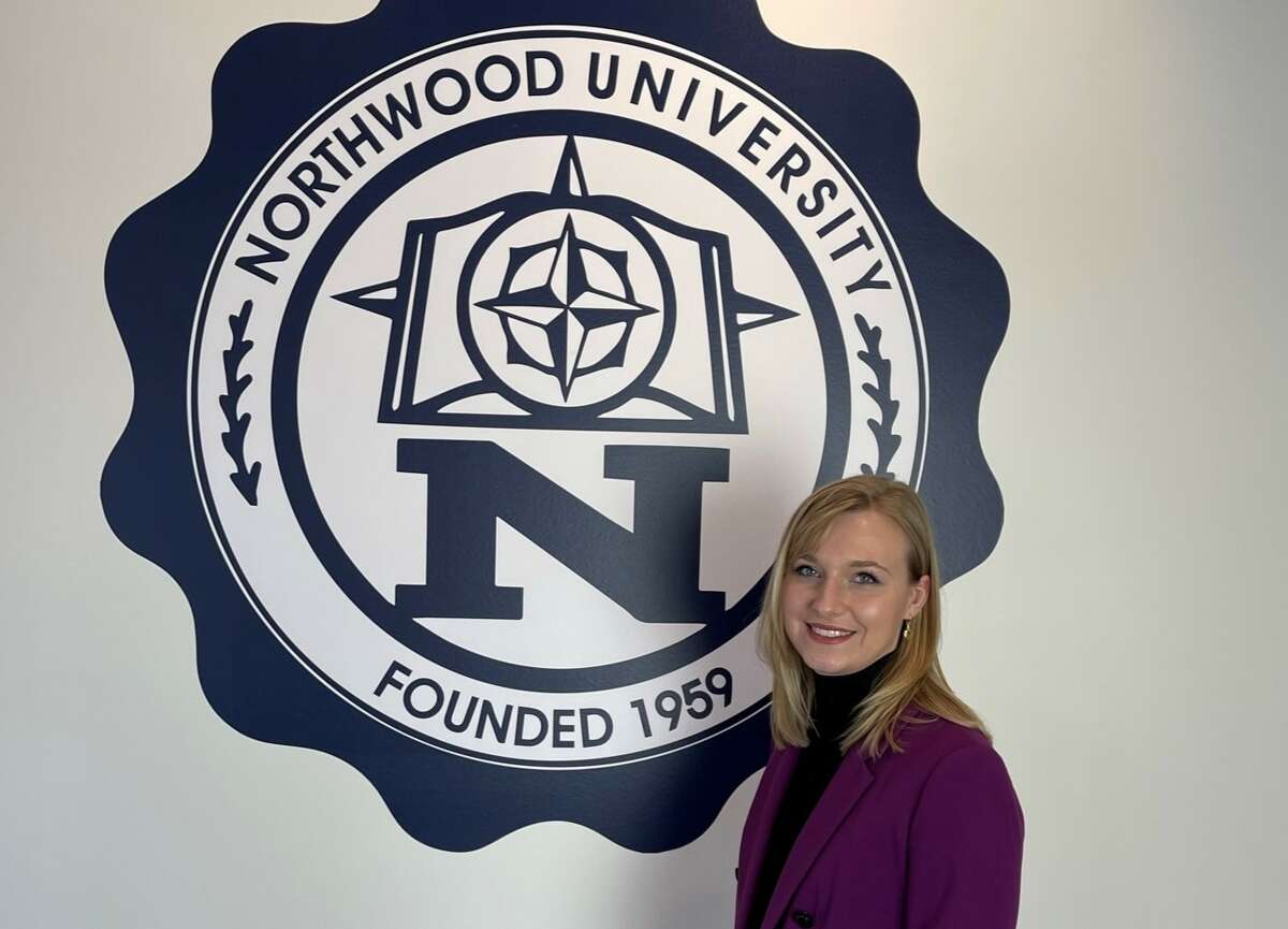 Previous Bauveric Contest winner pictured with the Northwood University academic seal