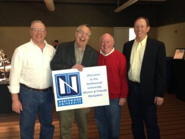 A group of Northwood University alum from the Pittsburgh chapter posing for a photo