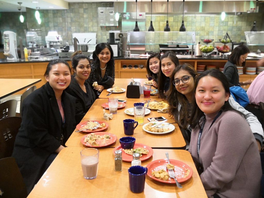 The International Student Organization eating in the Mid-Cafe