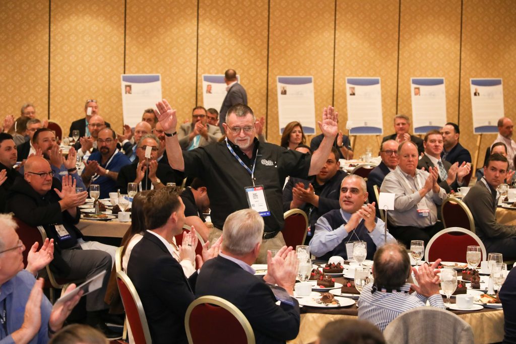 Automotive professionals being recognized at AAPEX