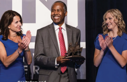 The cover of the Idea Magazine featuring Dr. Ben Carson receiving a Wings of Freedom award