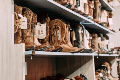 Cowboy boots sitting on a shelf