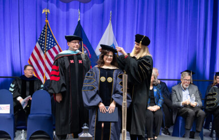 Doctoral graduate being hooded at Northwood Winter Commencement