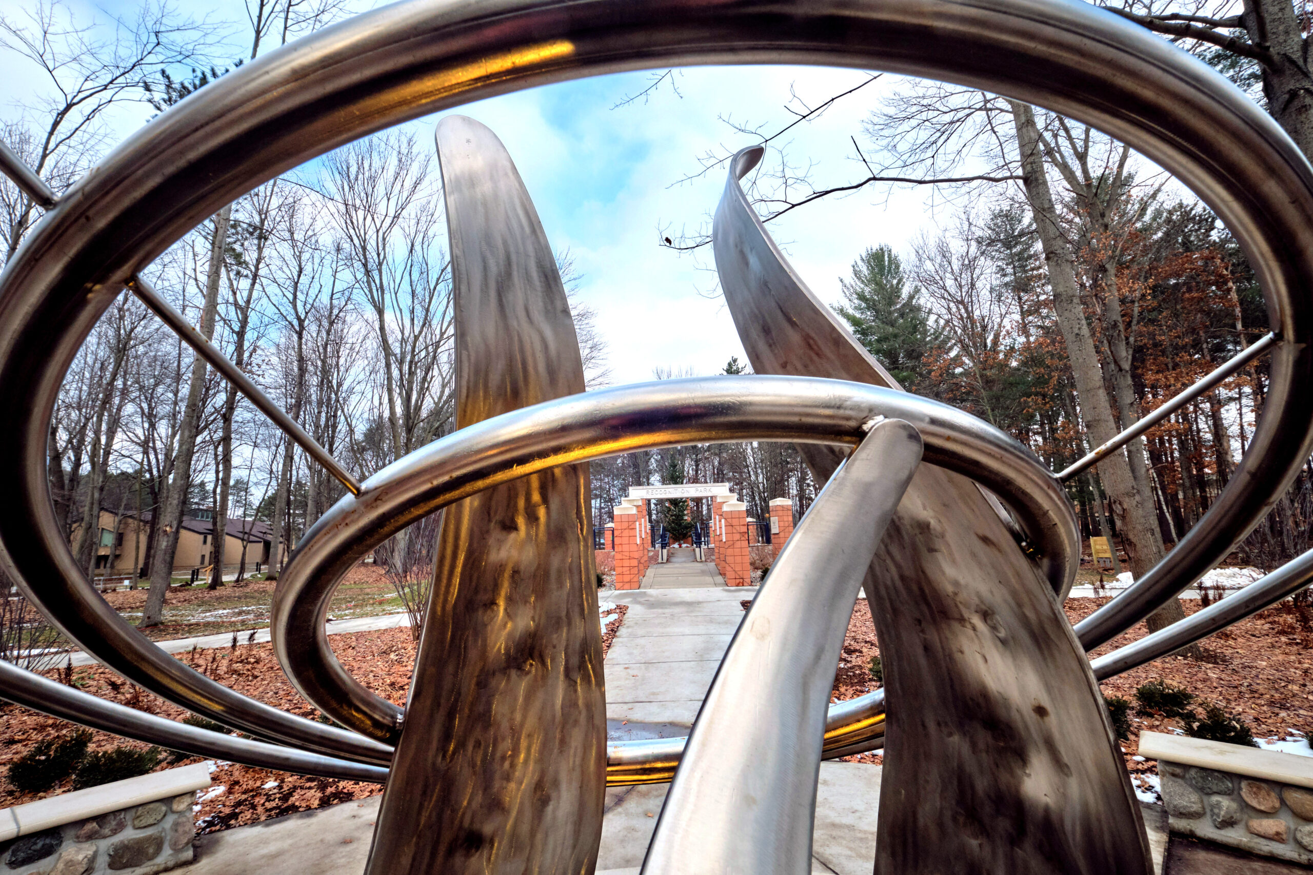 Up close picture of the Founders Flame sculpture on campus